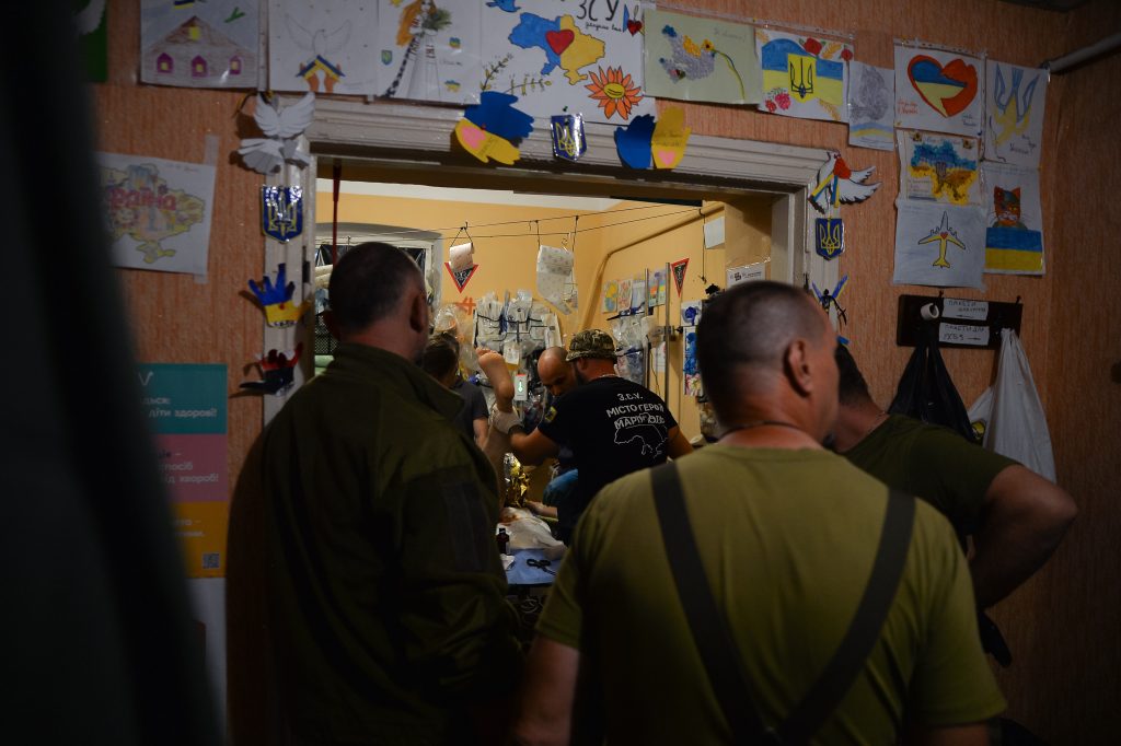 Forgotten On the Line soldiers outside the city of chasiv yar receive treatment following injury from a mortar attack