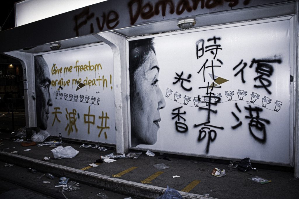 hong kong: remnants of the previous nights protests cover the streets